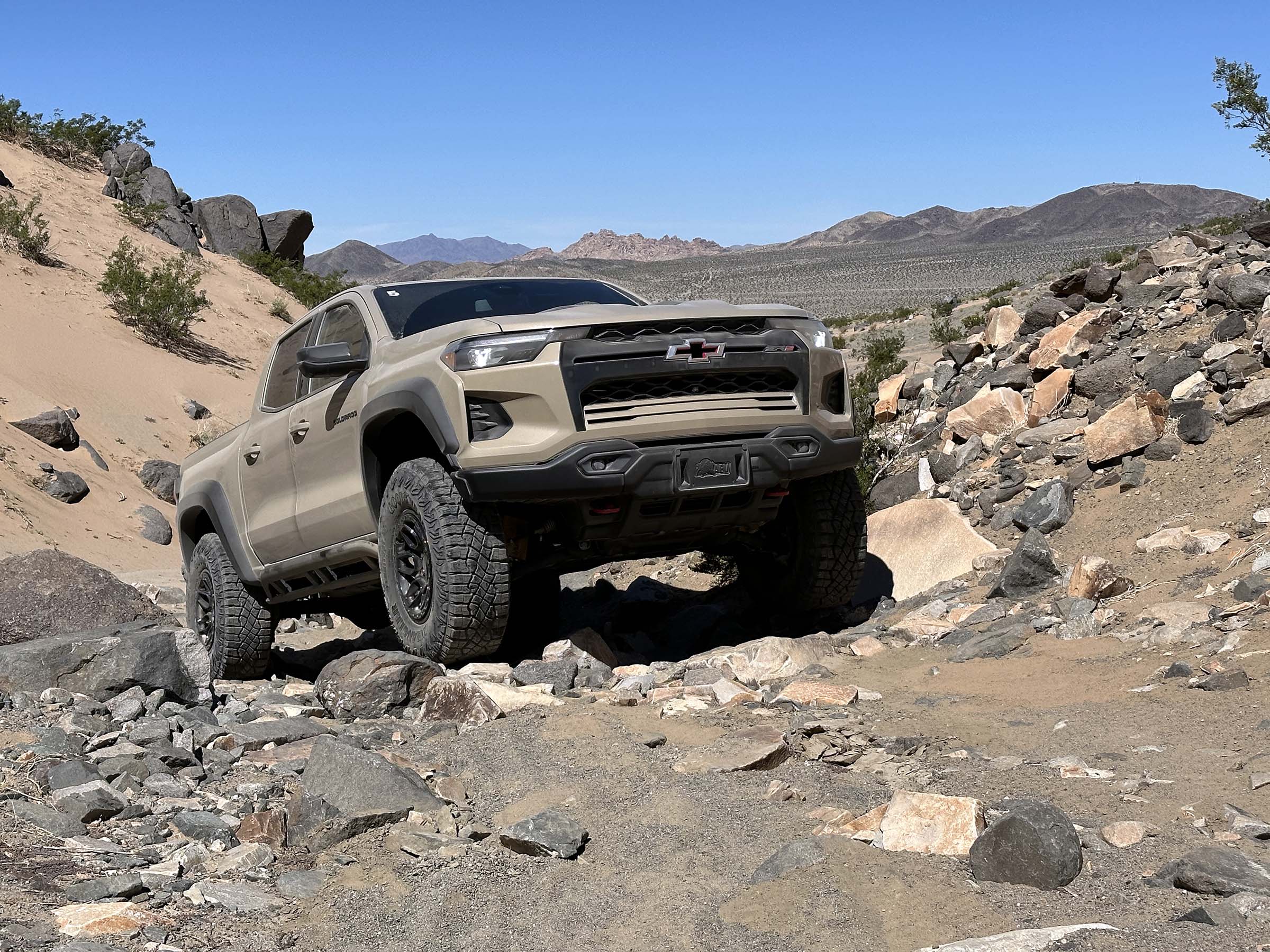 2024 Chevrolet Colorado ZR2 Bison - beauty shot cresting boulders