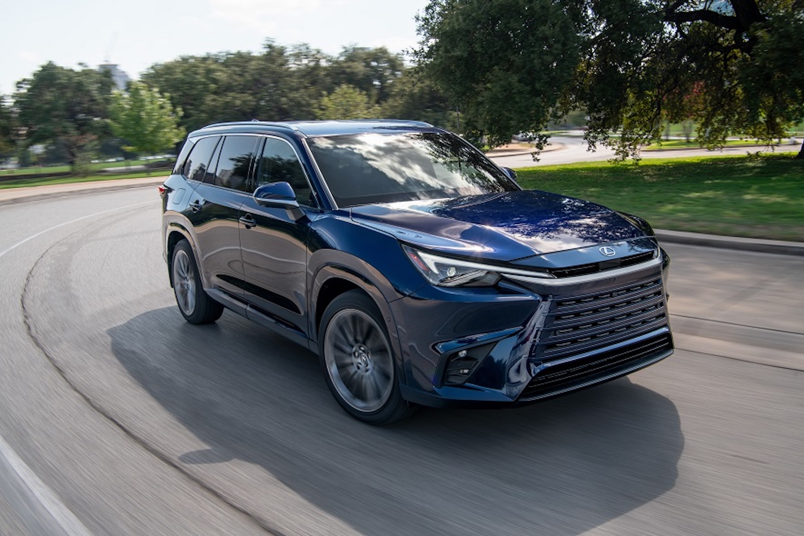 2024 Lexus TX 550h Nightfall Mica driving REL
