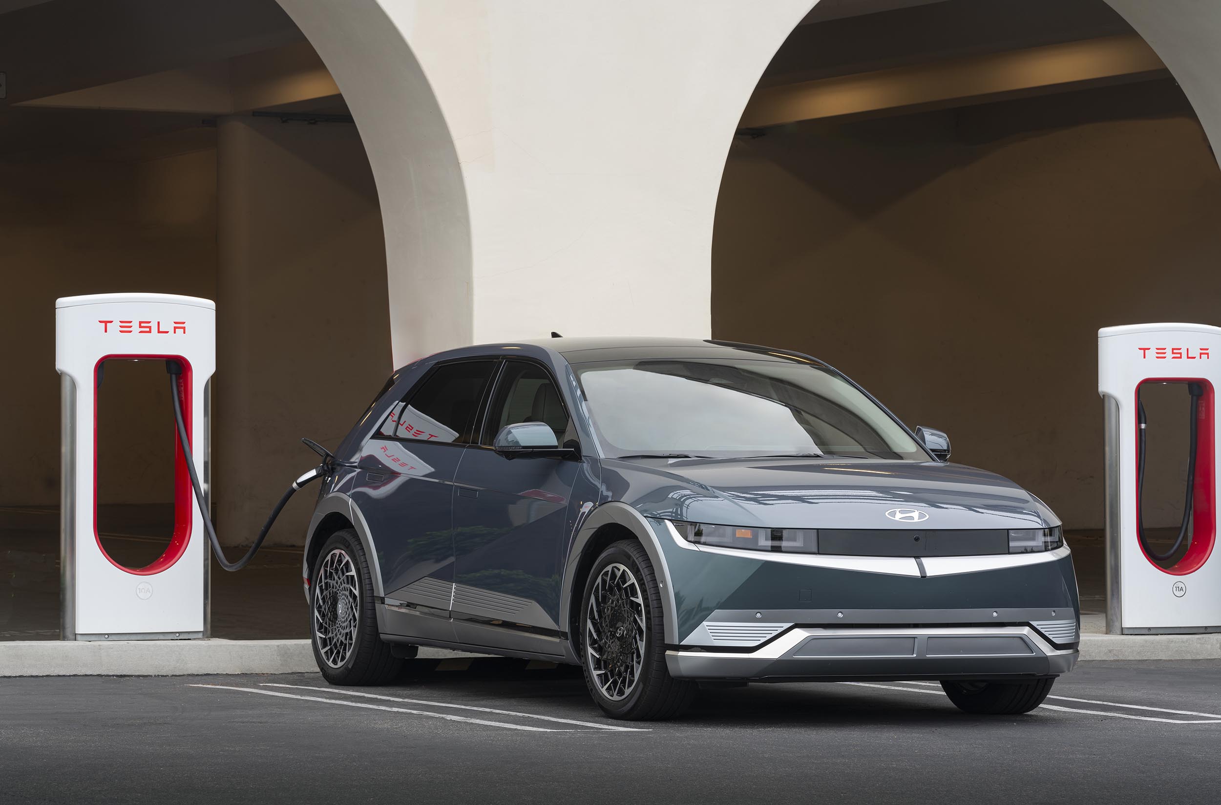Hyundai Ioniq 6 connected to a Tesla Supercharger