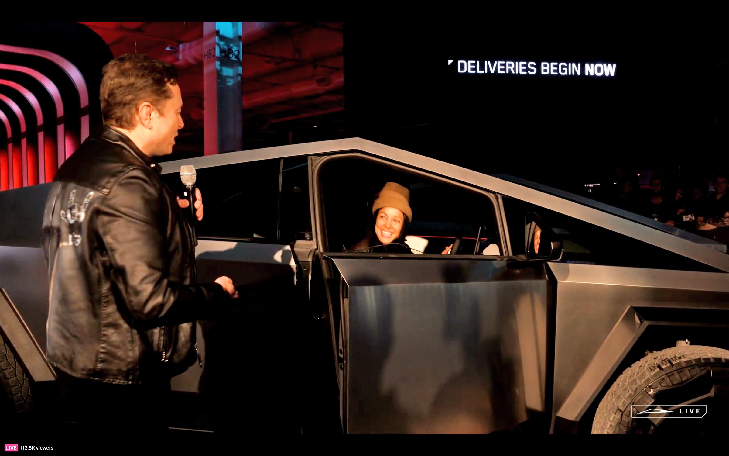 Musk and First Tesla Cybertruck Buyer